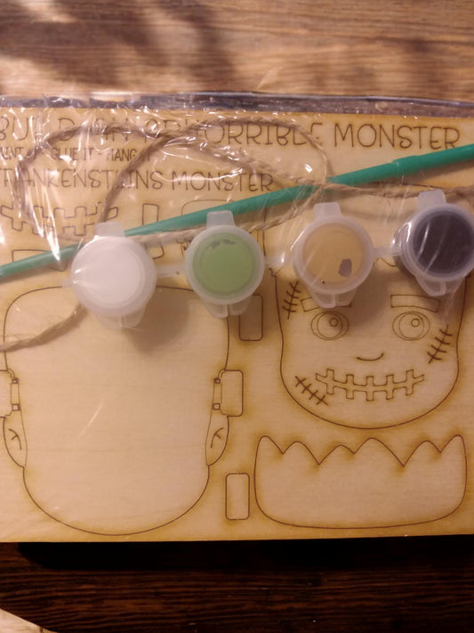 Paint kit, ornament, twine/magnet, paint and paint brush