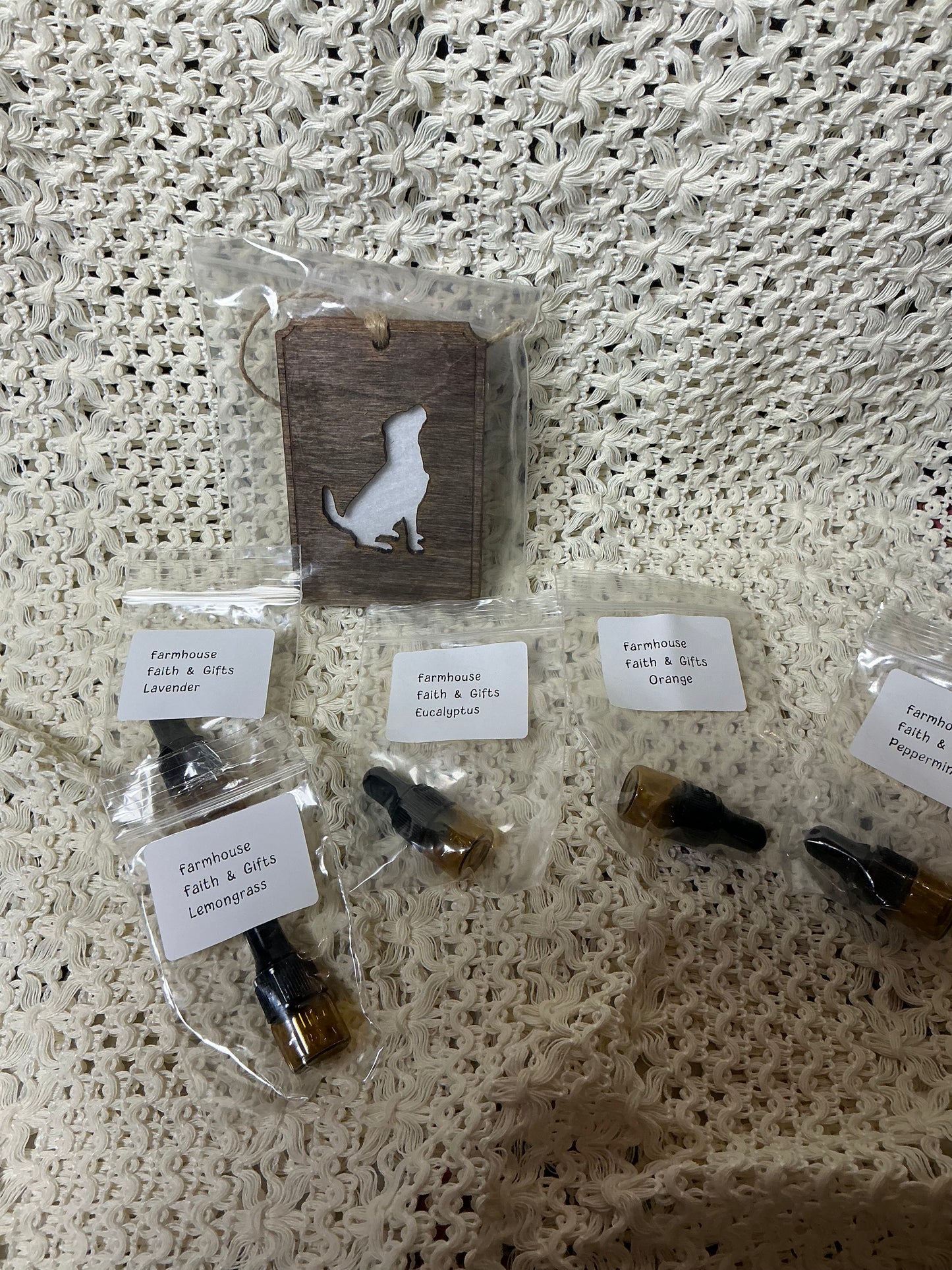 Hanging air freshener with essential oil
